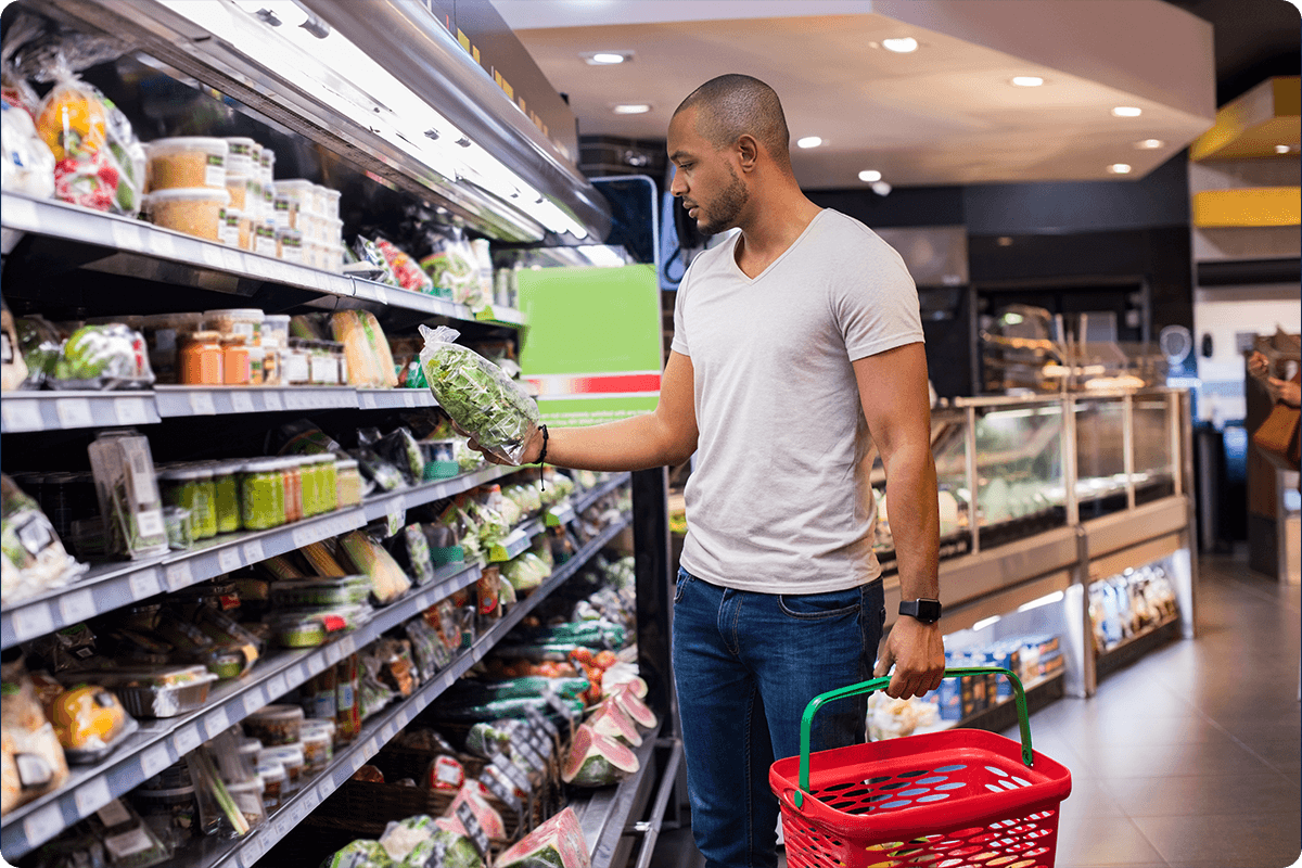 shopper-looking-at-fresh-produce-in-the-supermarket-png