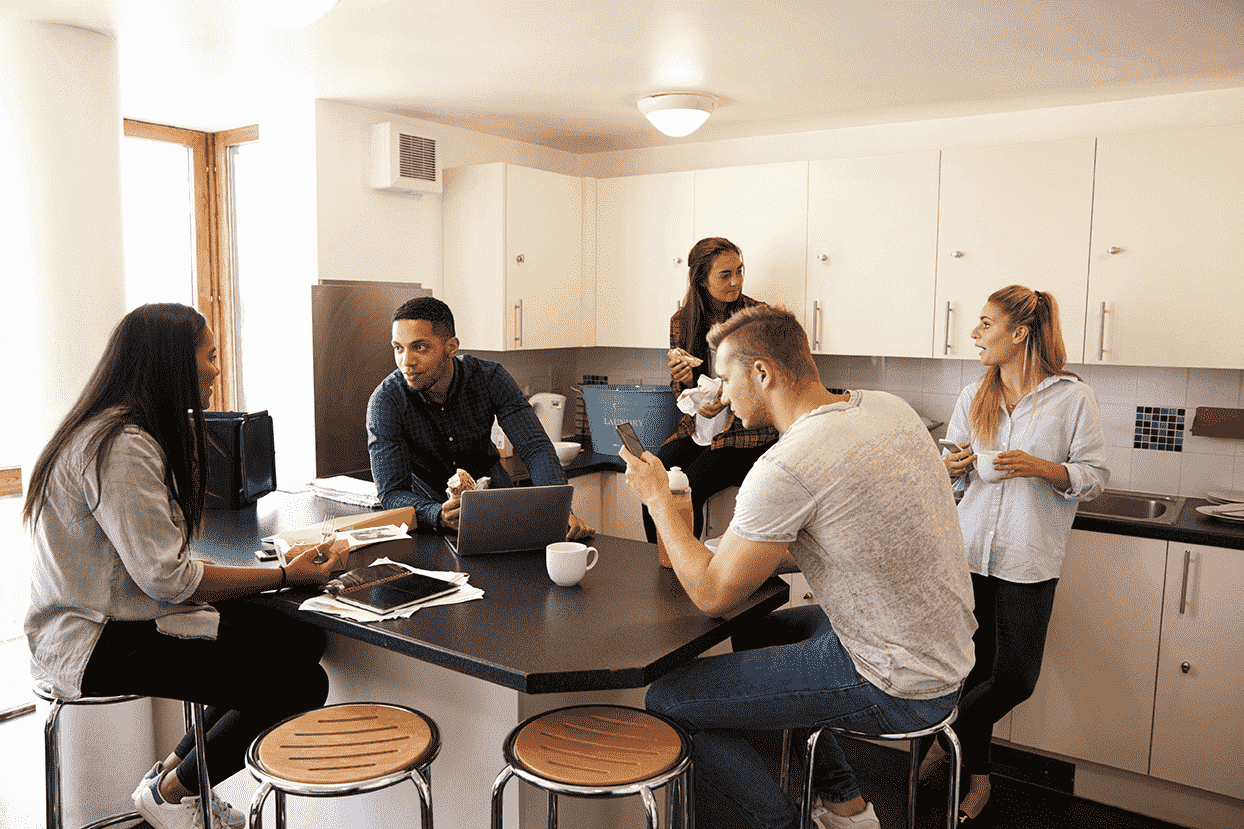 students having lunch in their communal kitchen[1]-min