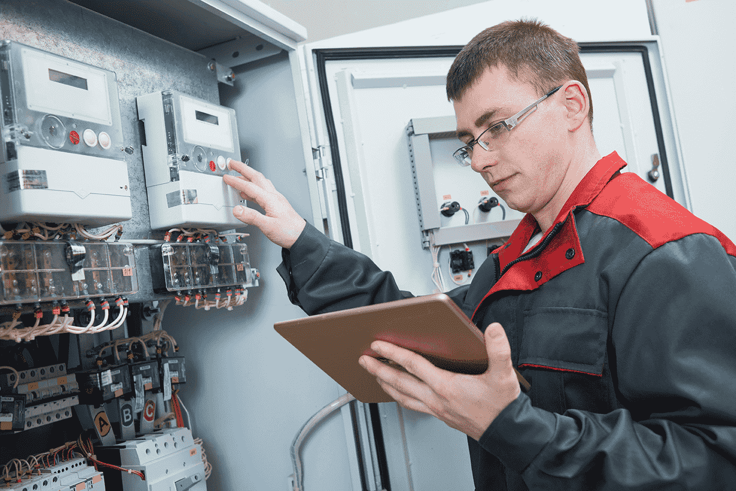 a maintenance worker checking an electrical box[1]-min